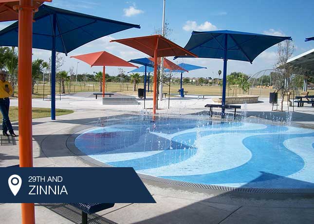 Red and blue shade covers for Zinnia Splash park by Kraftsman