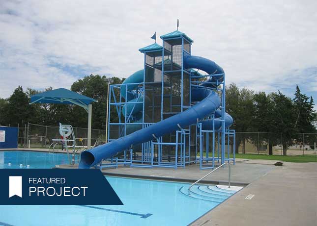 Big blue commercial water slide and shade covers by Kraftsman in Andrews, TX