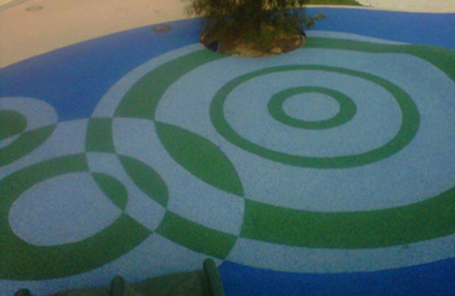 Safety Surfacing with a green and white concentric circles pattern by Kraftsman