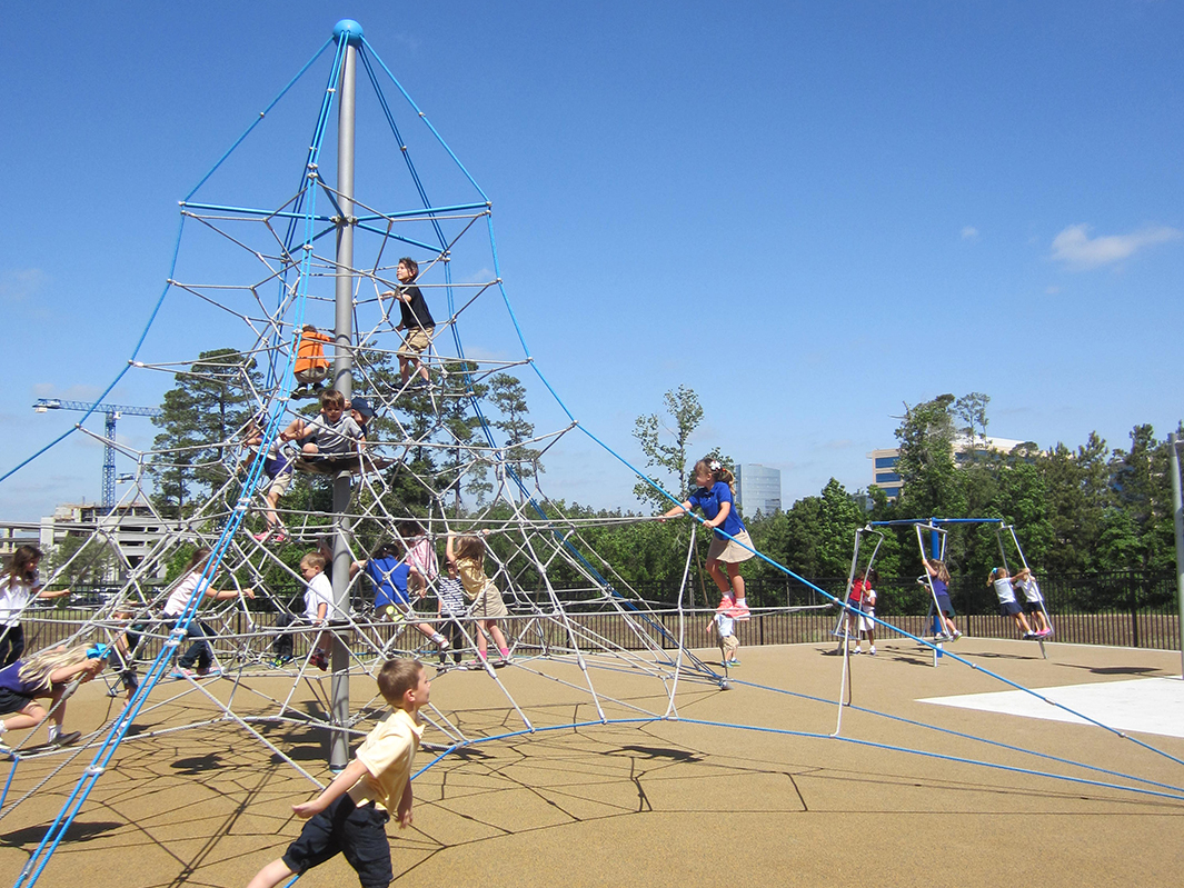 Kids Playing on The Woodlands United Methodist Church Rope Playground Climbing Nets by Kraftsman