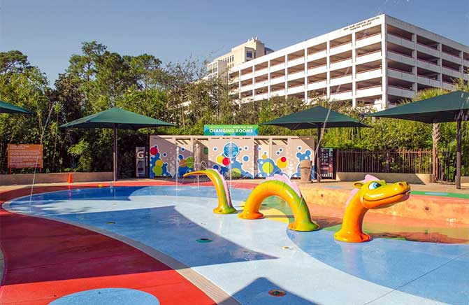 Commercial Water Park or splash pad with a serpent Designed by Kraftsman