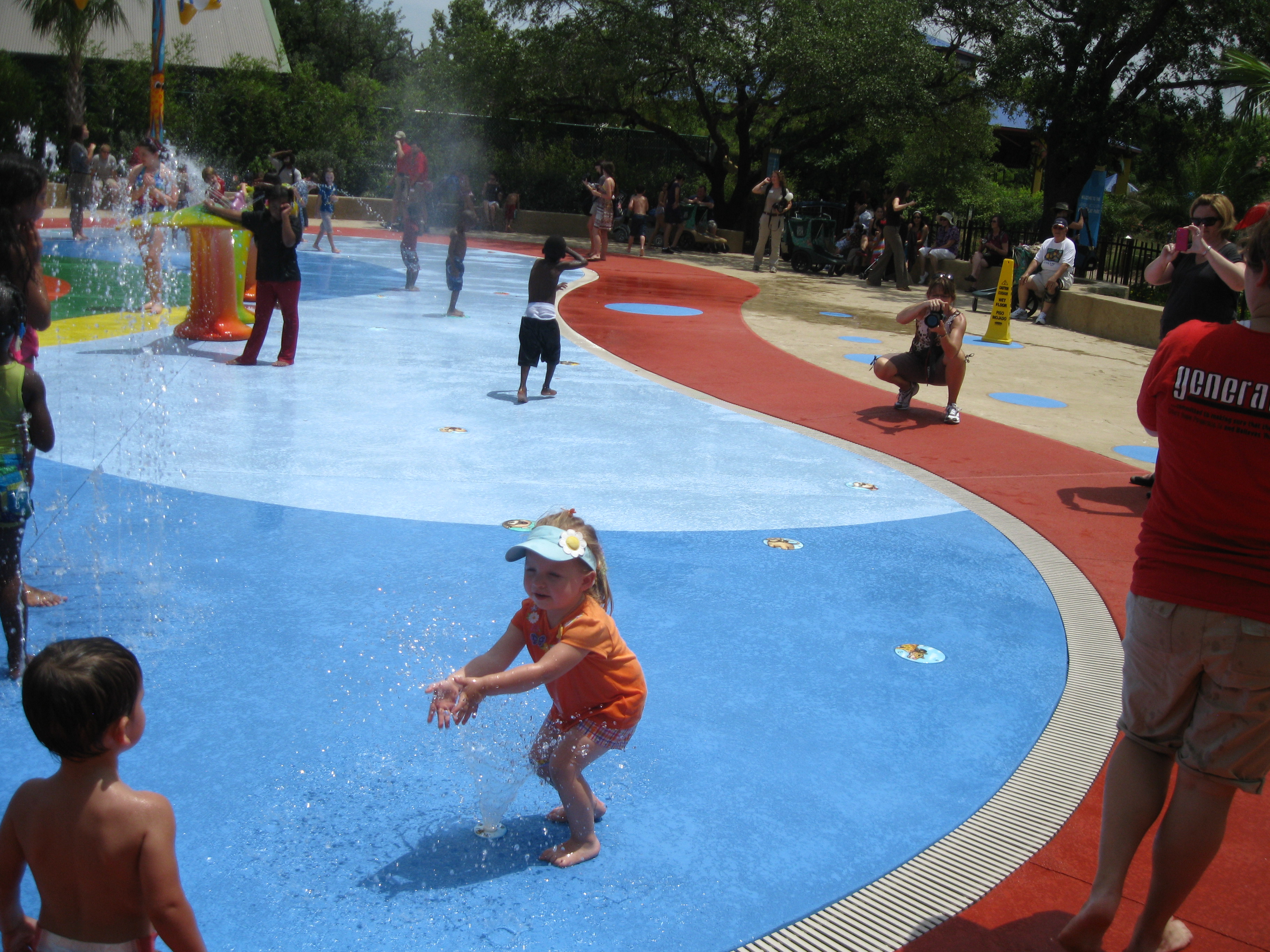 Kids playing at Houston Water Play Park Splash Pad Design by Kraftsman
