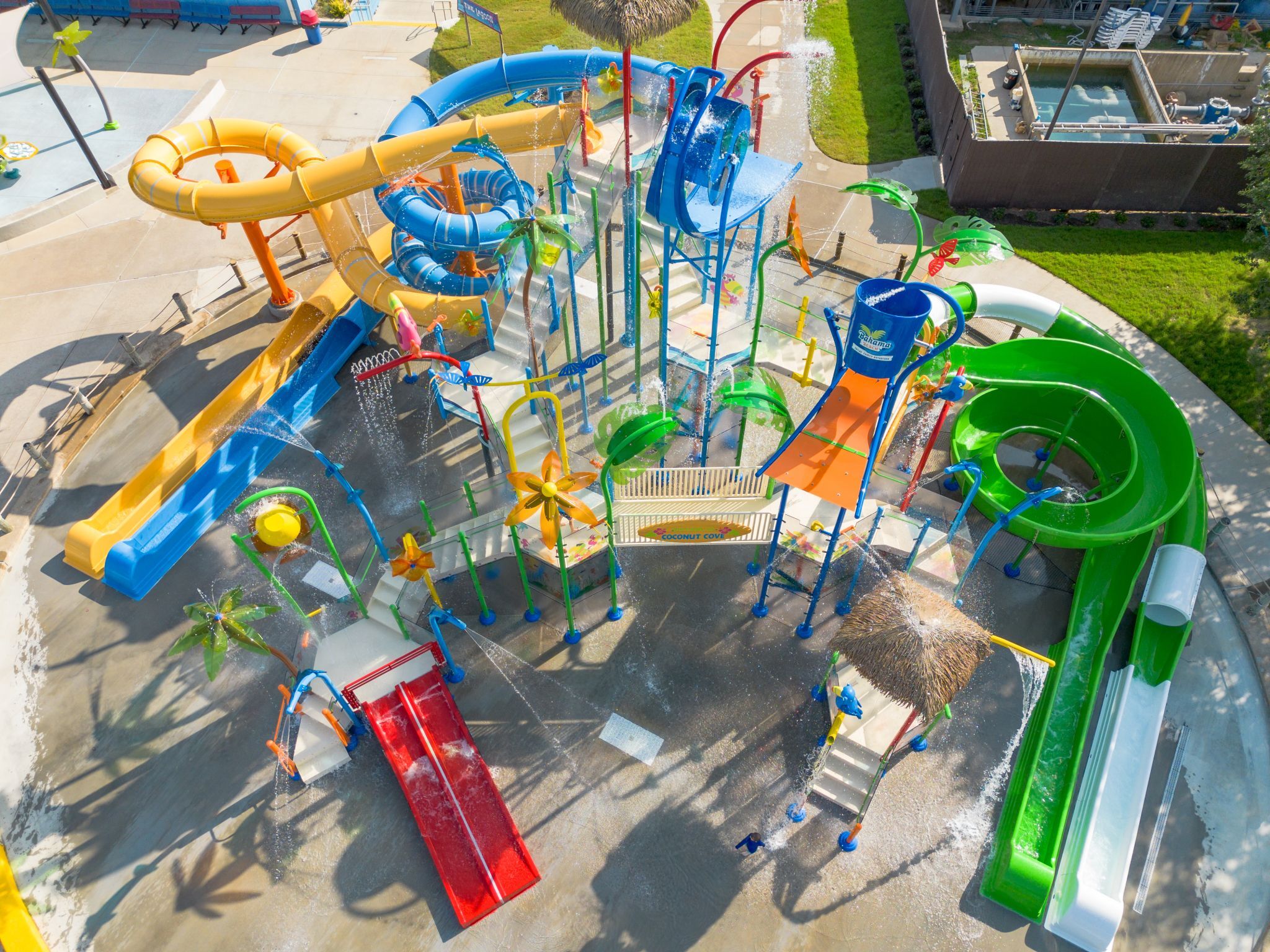Aerial view of Bahama Beach Waterpark's Elevations aquatic play structure with colorful waterslides in Dallas, Texas