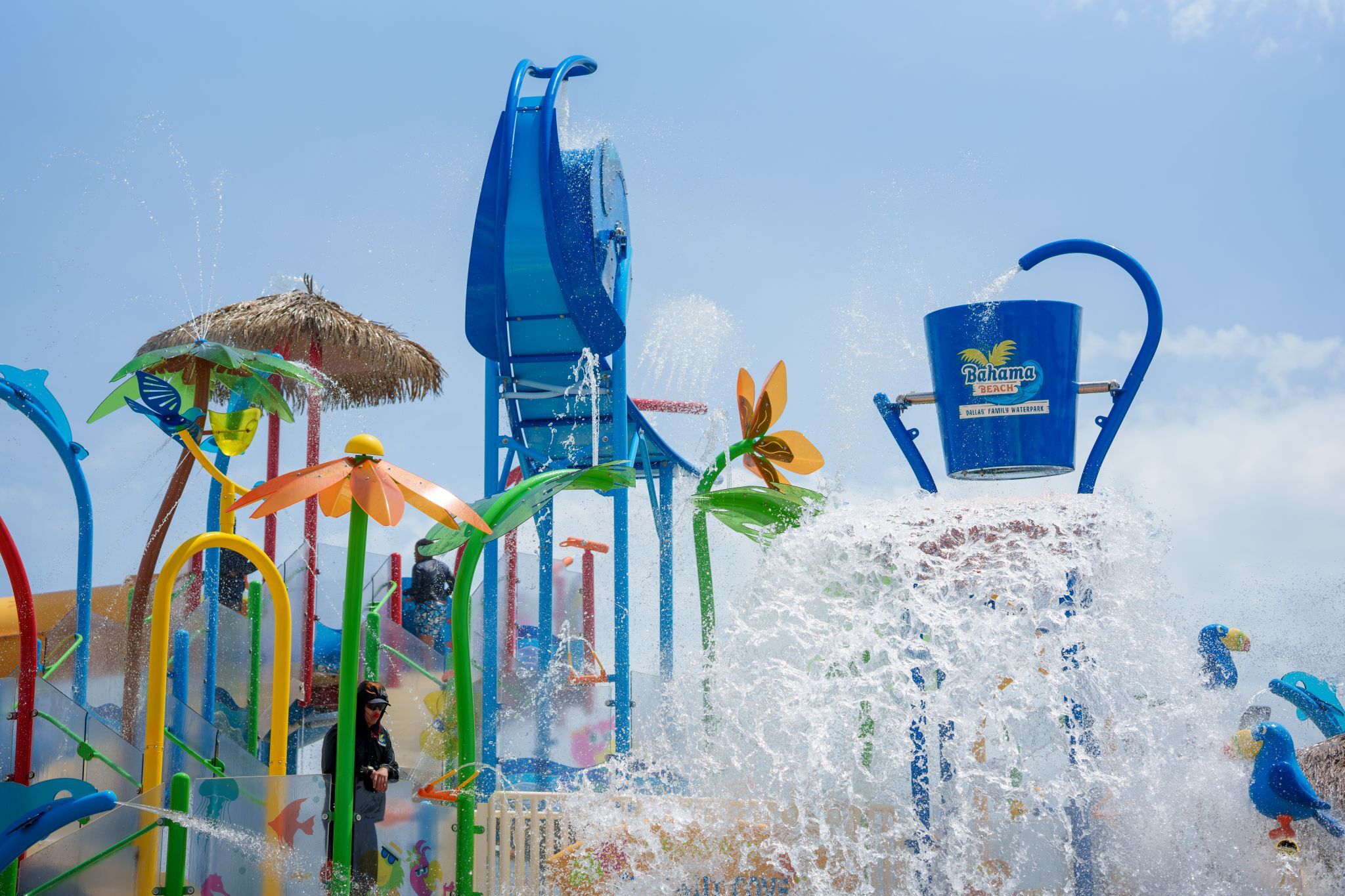 Bahama Beach Waterpark's Elevations aquatic play structure with colorful waterslides in Dallas, Texas