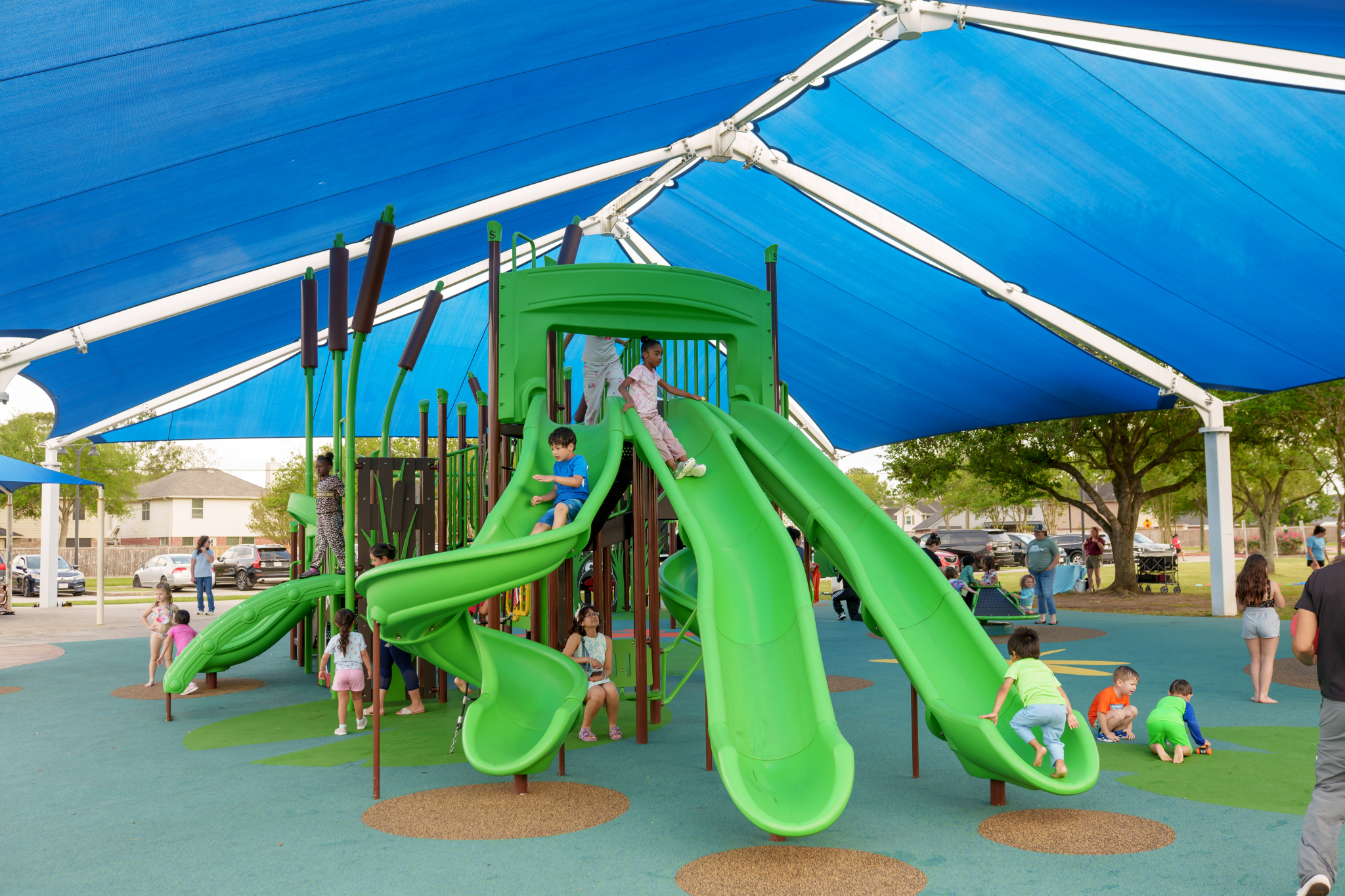 children sliding down slides
